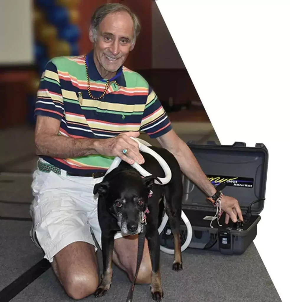 Dr Marty with a pet during pemf treatment